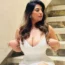 Rasha Kirmani flaunts her Ample Busts in Deep Neckline White dress