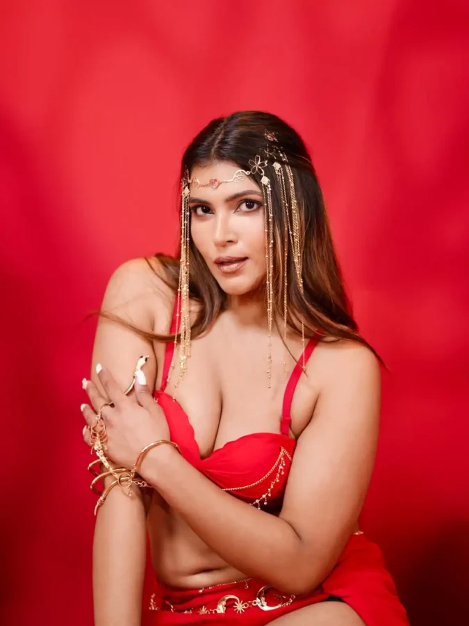 Tanya Chaudhari's deep cleavage in Red bralette 4