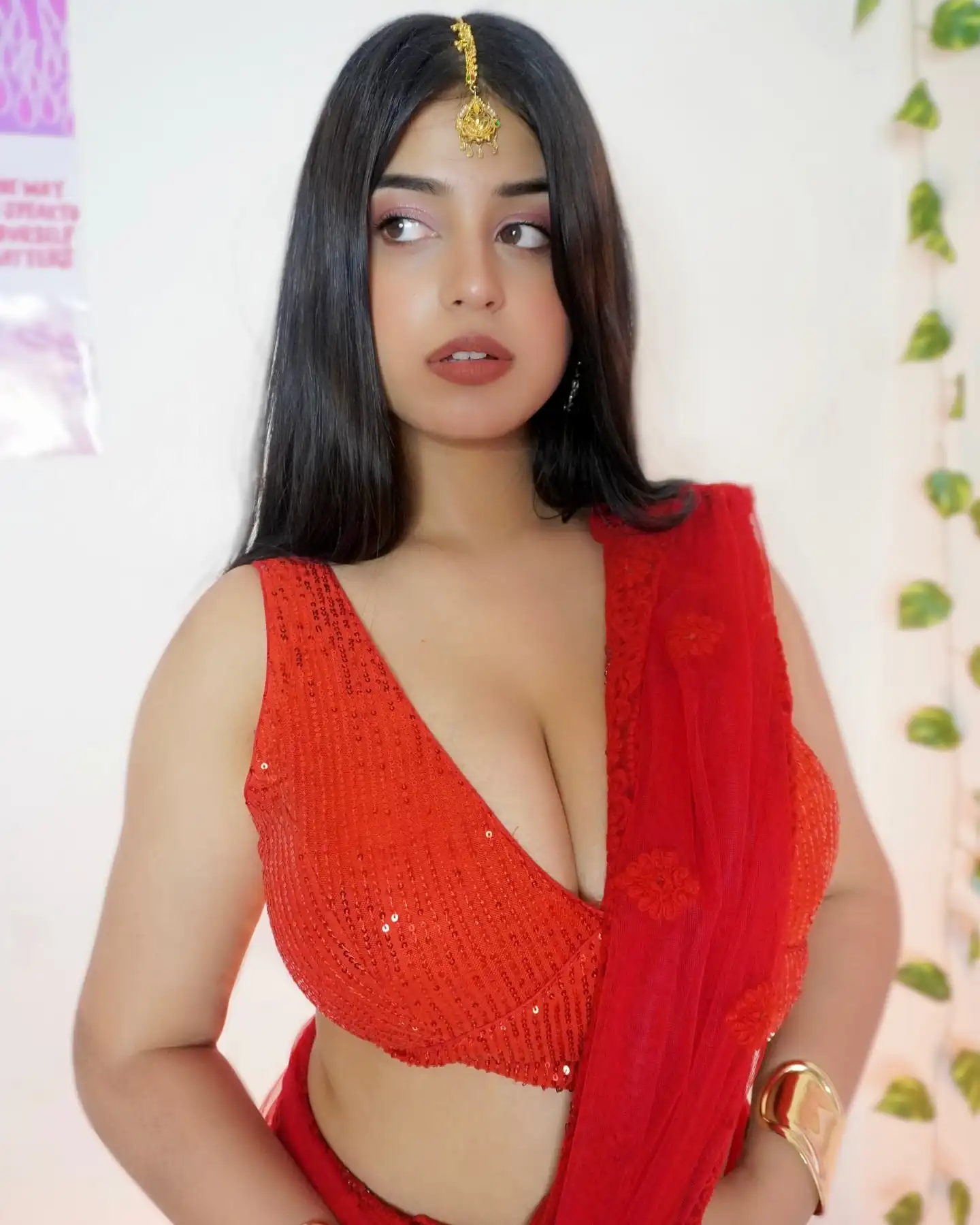 Tushikha Goswami Flaunts Voluptuous Cleavage In Shimmering Red Saree Blouse