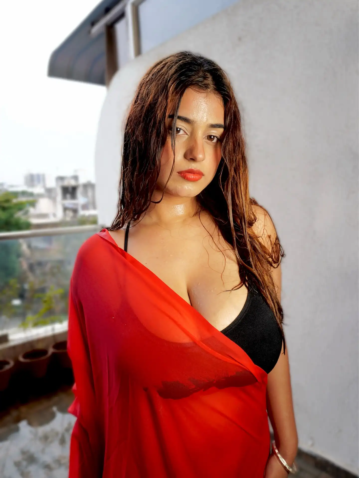 Tushikha Goswami Flaunts Wet Cleavage In Sheer Red Saree And Black Bralette