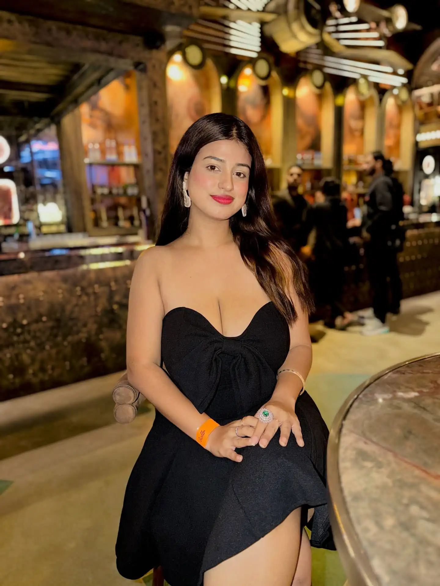 Tushikha Goswami Shows Off Cleavage In Black Bow Style Tube Mini Dress