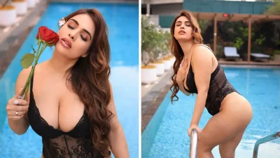 Neha Malik in Black Lace Bodysuit Flaunting Deep Cleavage